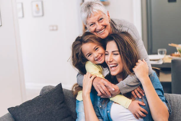 A senior woman with her daughter and granddaughter, reused from the current GoHelpDo website